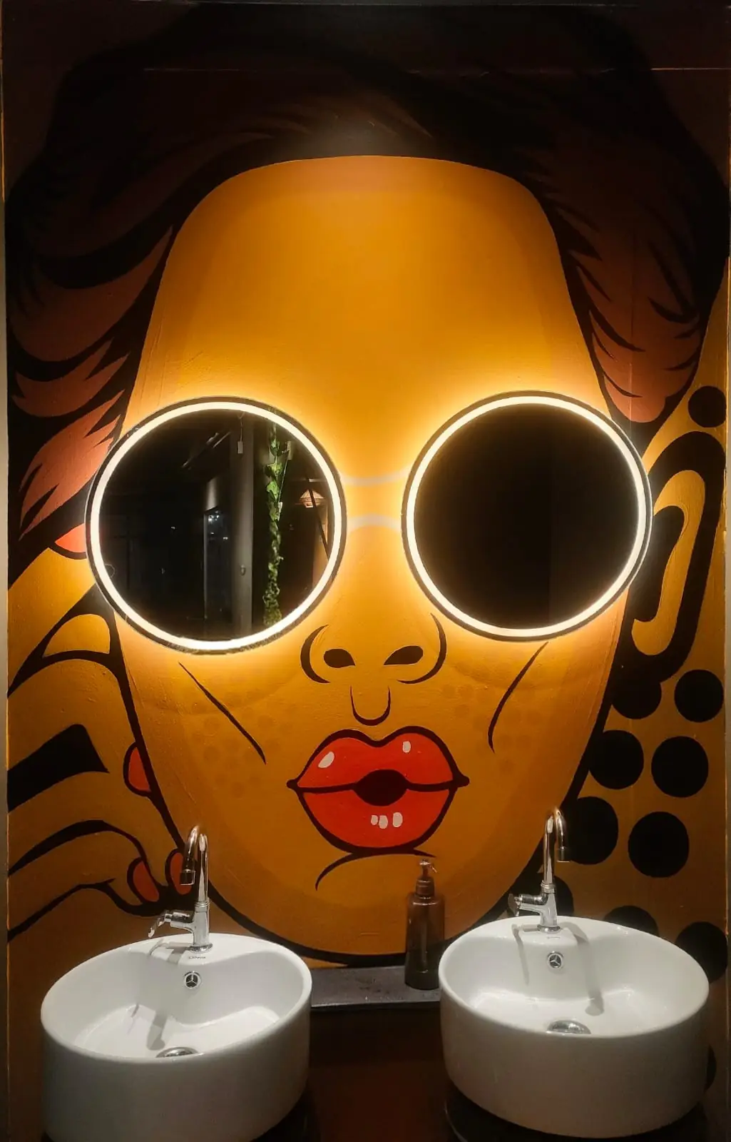 Stylish pop art washroom mirror feature